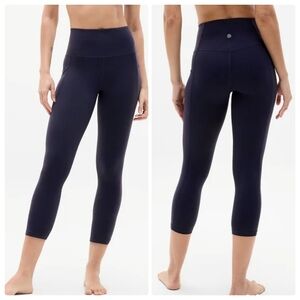 Athleta Women's Salutation Stash Pocket Tight 19" Inseam Navy Blue Size Medium.